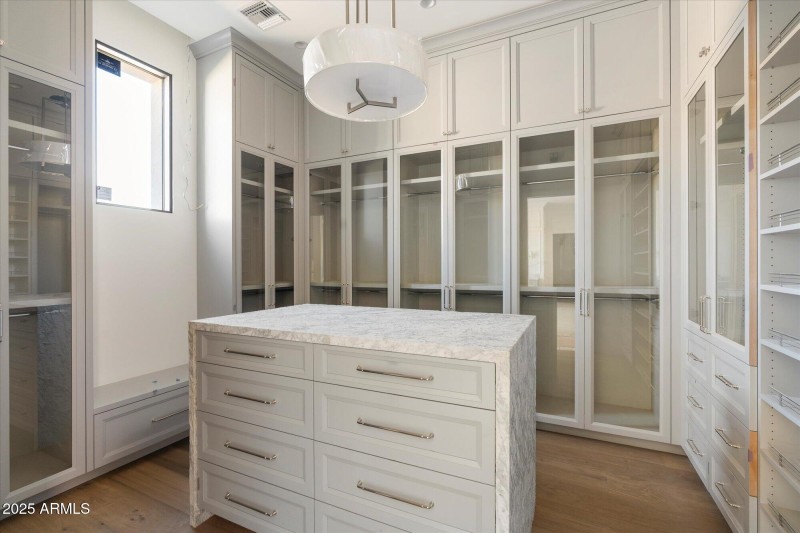 1 of 2 Primary Closets