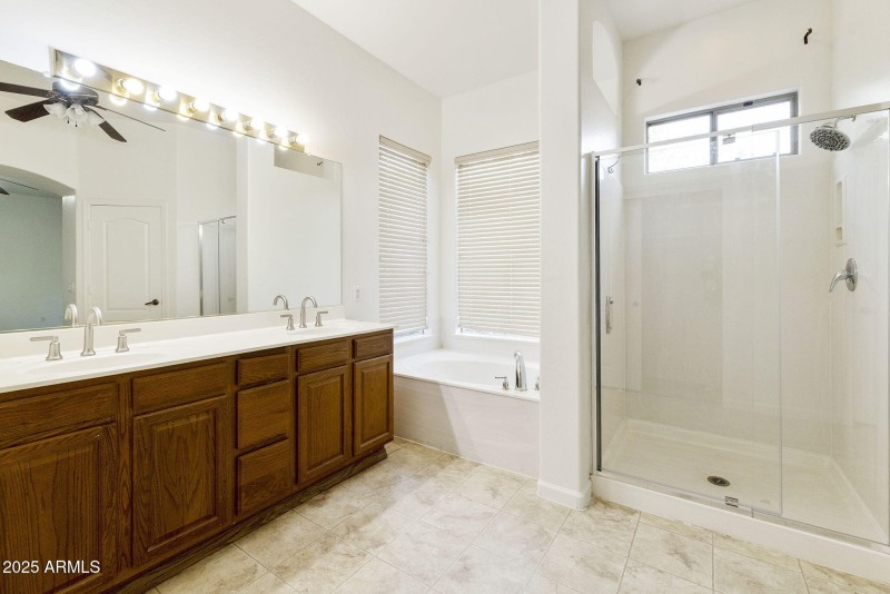 primary bath with new shower doors