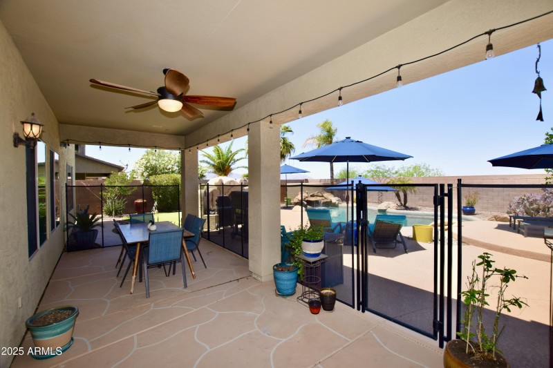Covered Patio with Pool Fence