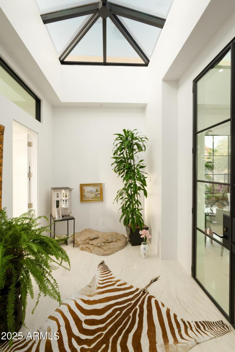 Glass Atrium off of Primary Suite