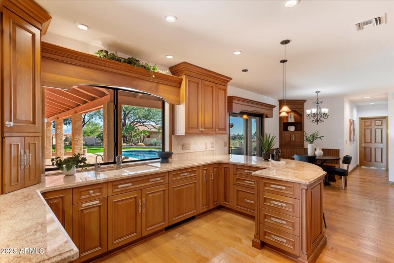 eautiful Chef’s Kitchen with Pool View