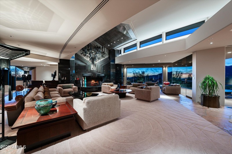 Great room withfloor to ceiling glass