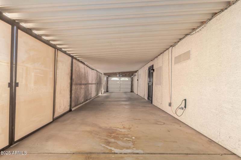 32 Carport w/ garage Door