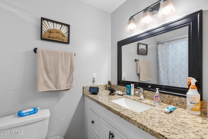 Guest bathroom with tub and shower combo