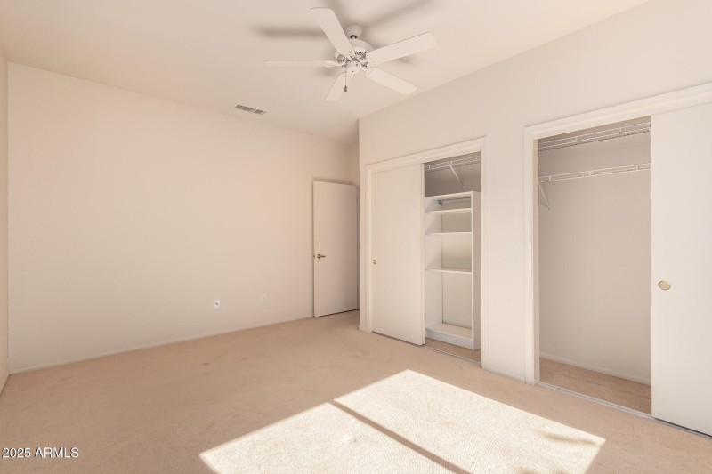 Guest Bedroom With Double Closet