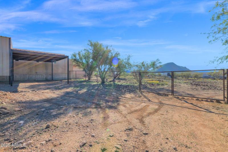 Carport behind RV shade