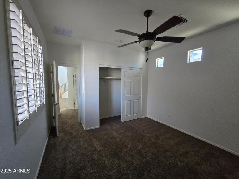 bedroom 2 with walk in closet