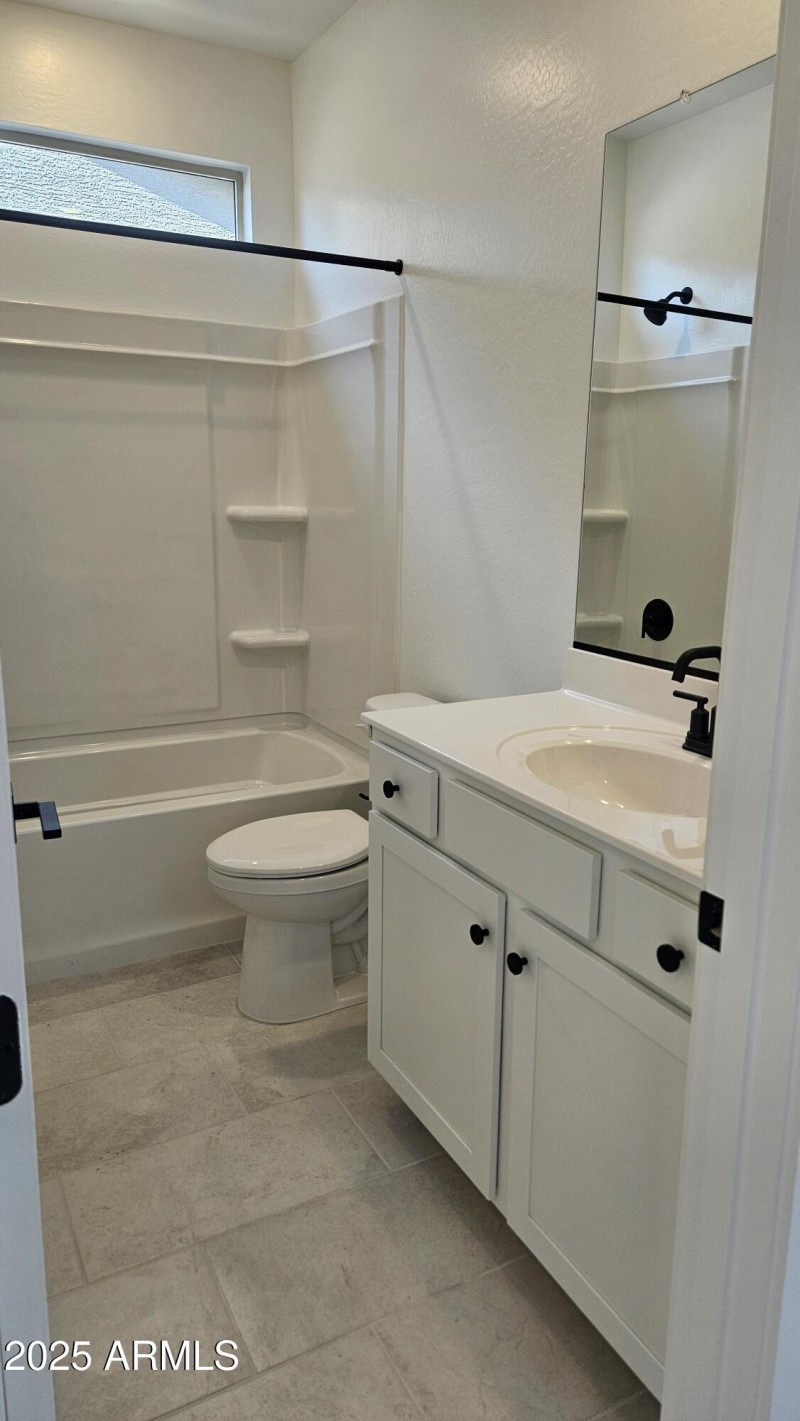 Full Bathroom with Dual Sinks and 2 Do