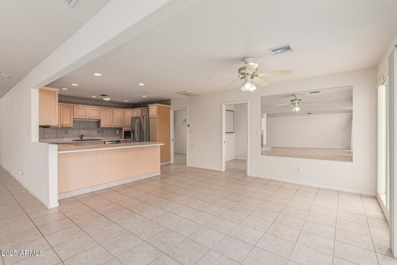 Kitchen overlooks family Room 14