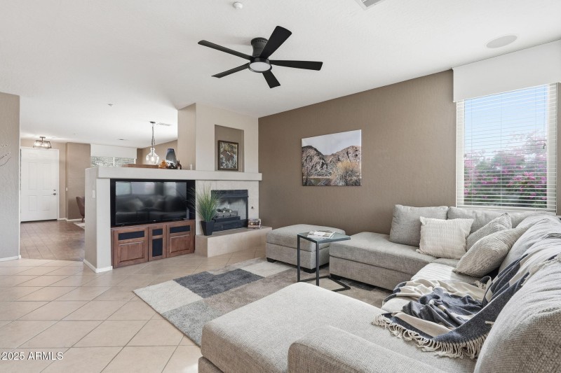 Large family room with gas fireplace.
