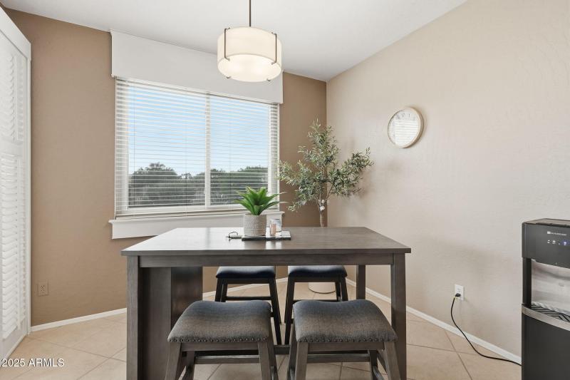 kitchen overlooking backyard/patio