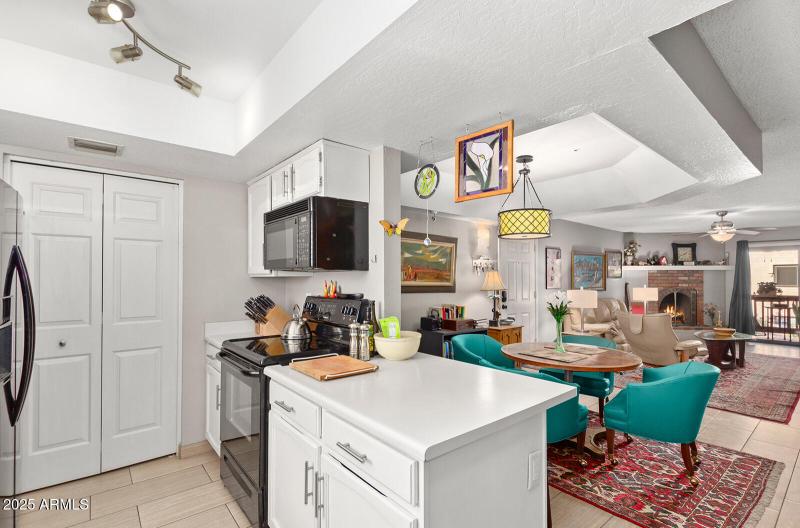 KITVHEN OVERLOOKS DINING