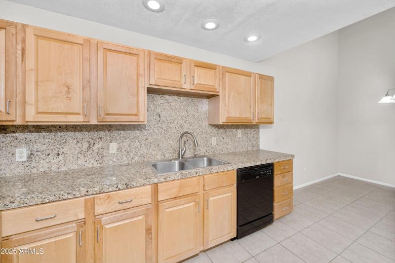 upgraded cabinets & granite