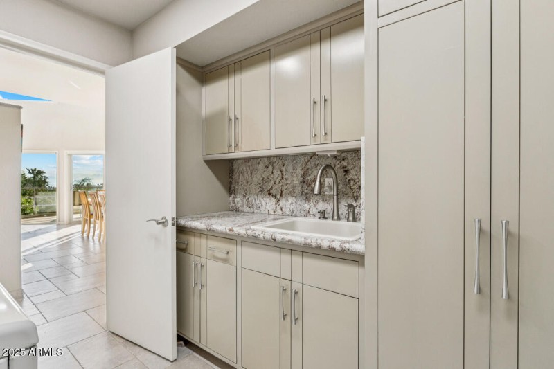 Laundry with ample cabinets