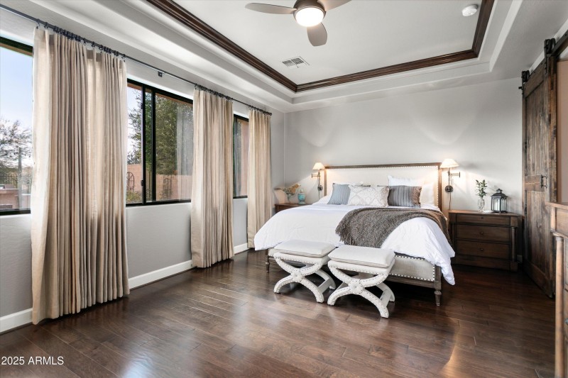 Wood floors at Primary Bedroom