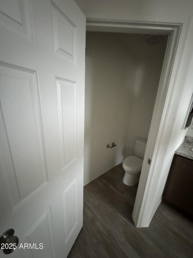 master bath enclosed toilet