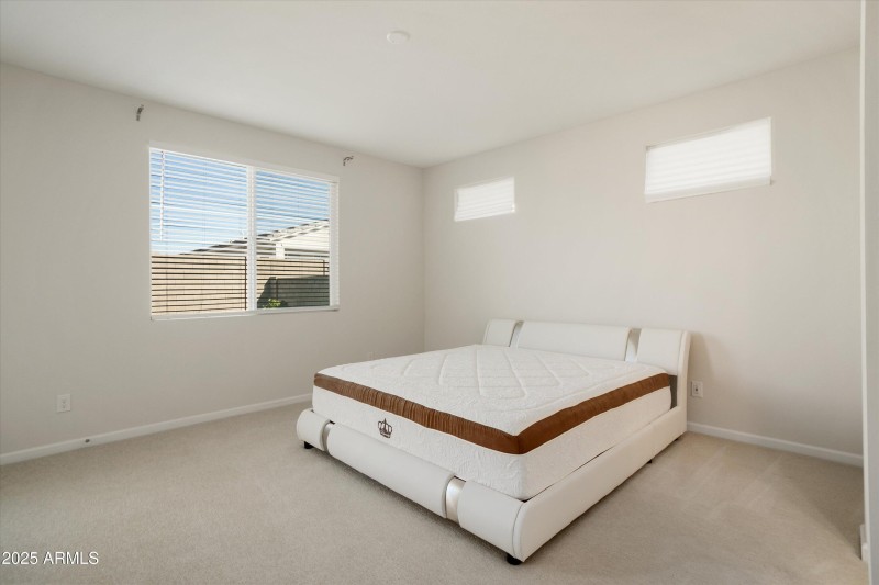 Spacious Primary Bedroom with Bed