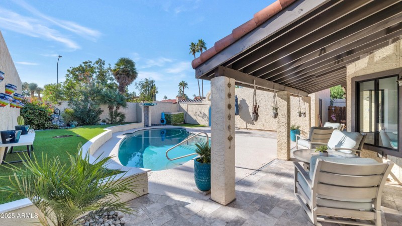 Covered Patio Overlooking Pool