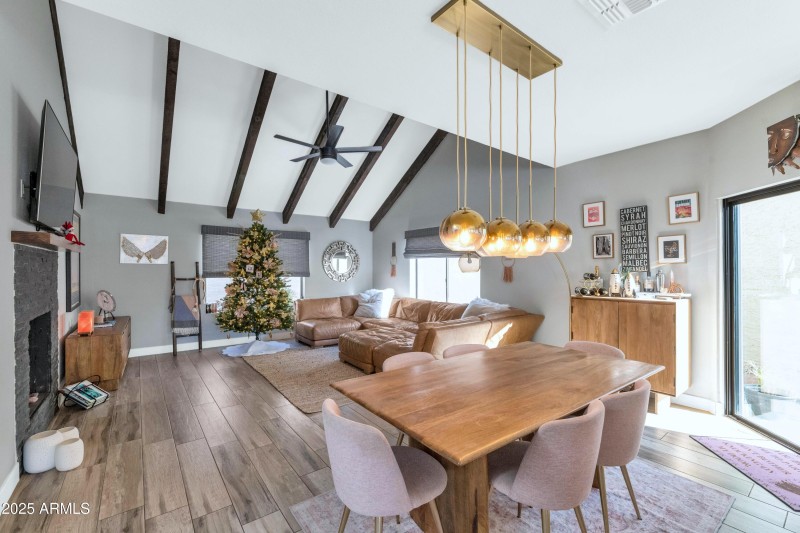 Open Living With Beamed Ceilings