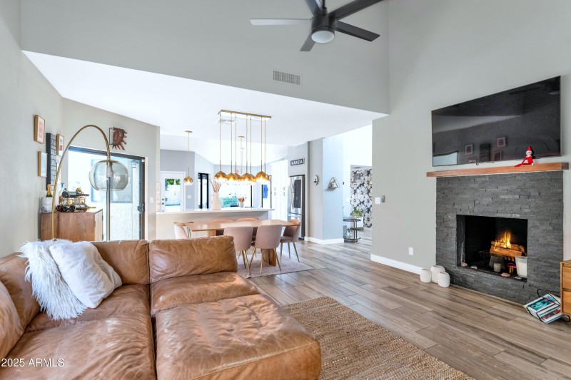 Open Living With Fireplace and Dining