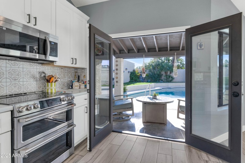 Kitchen Opens to Patio and Pool