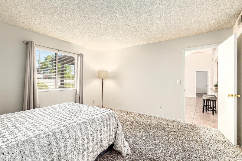 1 of 2 primary bedrooms