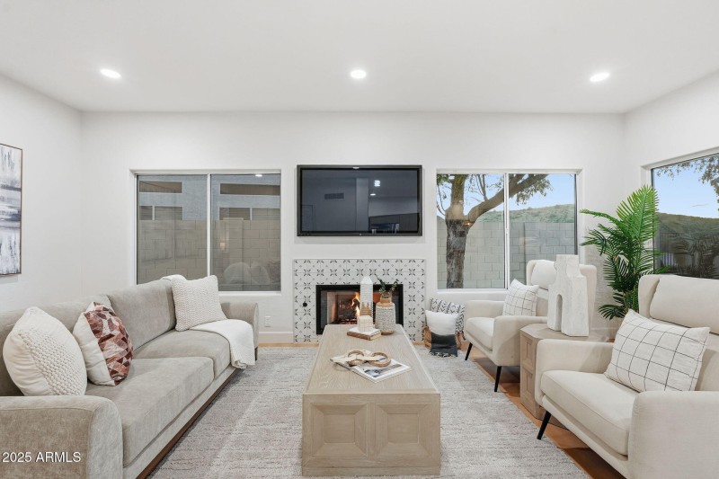 Fireplace open to kitchen
