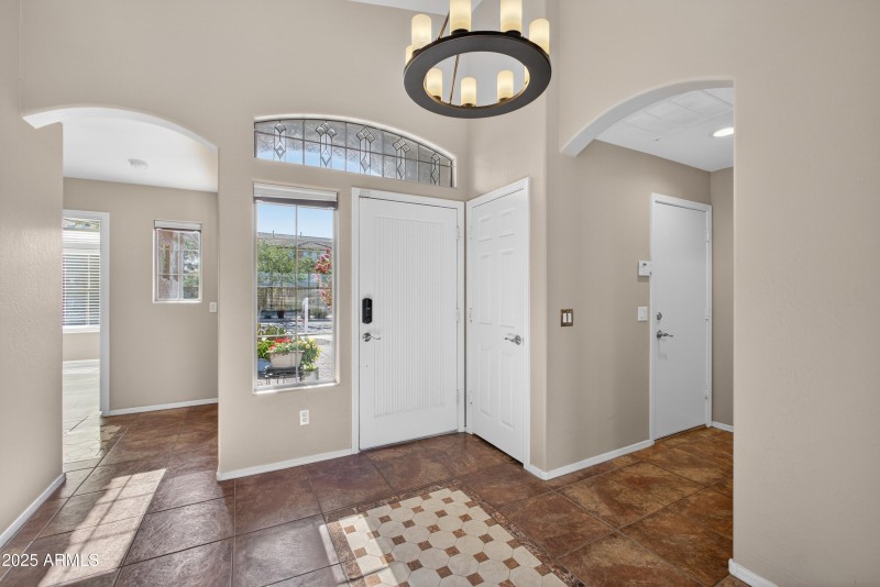 Entry with black matte light fixture