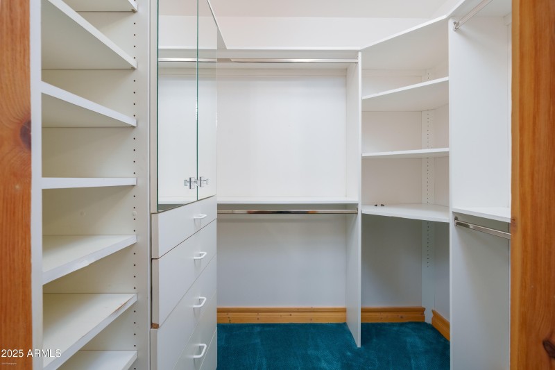 Large Walk-In Closet With Built-Ins