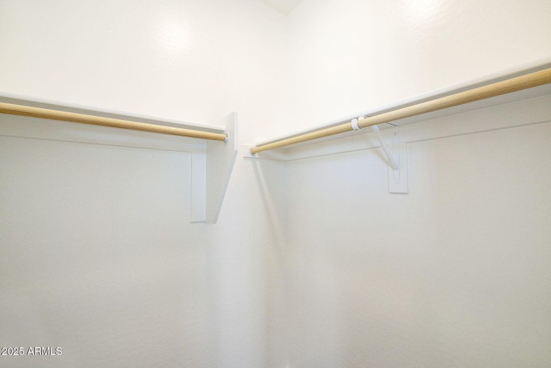 FRONT BEDROOM WALK IN CLOSET