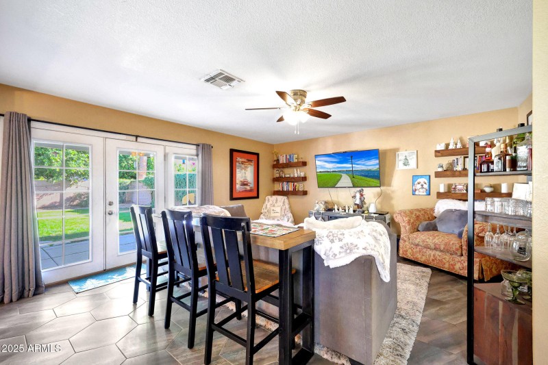French Doors Open to Backyard