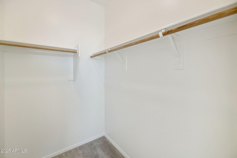 FRONT BEDROOM WALK IN CLOSET