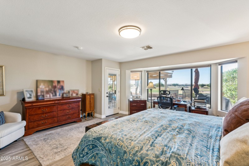 WALL OF WINDOWS IN MASTER BEDROOM