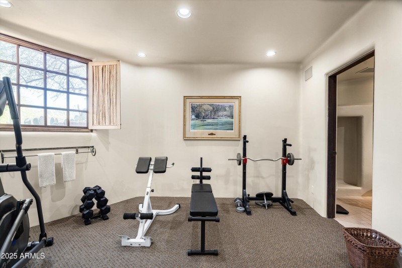 Guest Quarters downstairs bedroom/gym 56