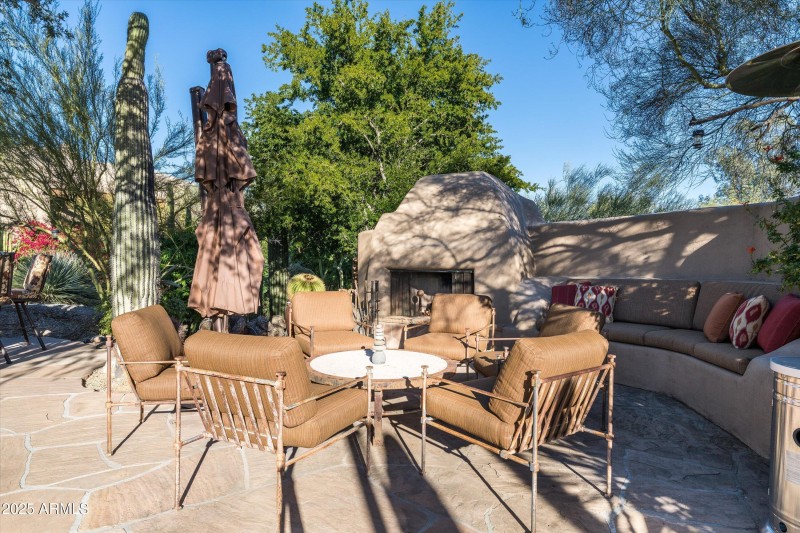 Pool sitting area and fireplace-64