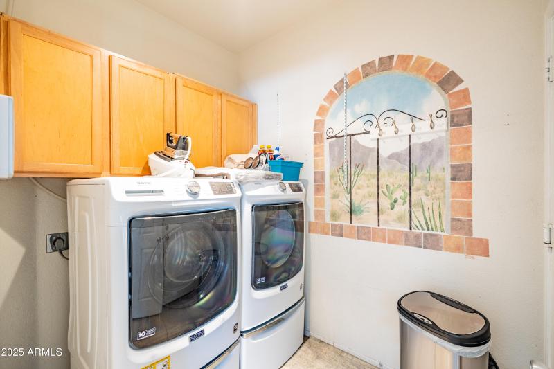 Spacious Laundry Room w/Storage Cabinets