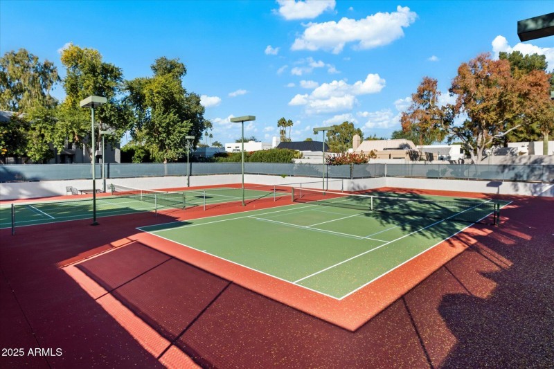 Tennis courts just steps from the unit