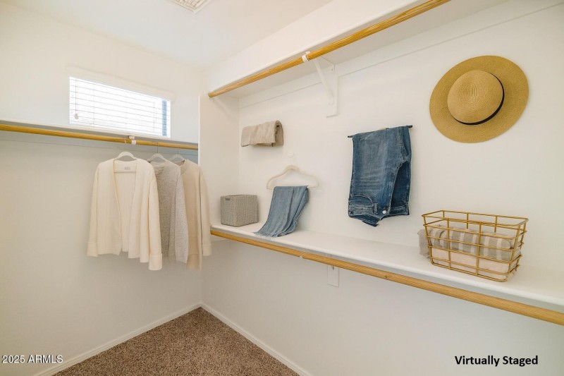 Primary closet - virtually staged