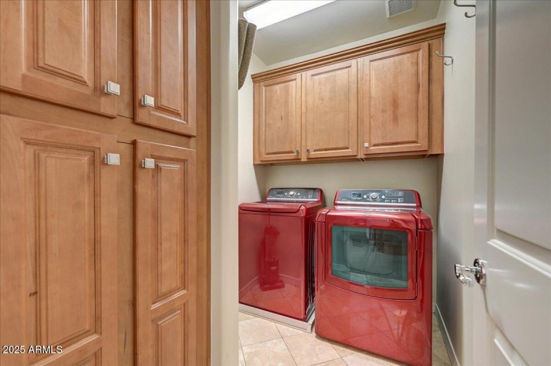 Large Laundry room with ample storage