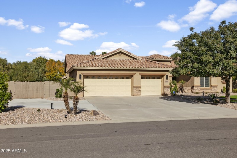 3 CAR GARAGE AND EXTRA PARKING