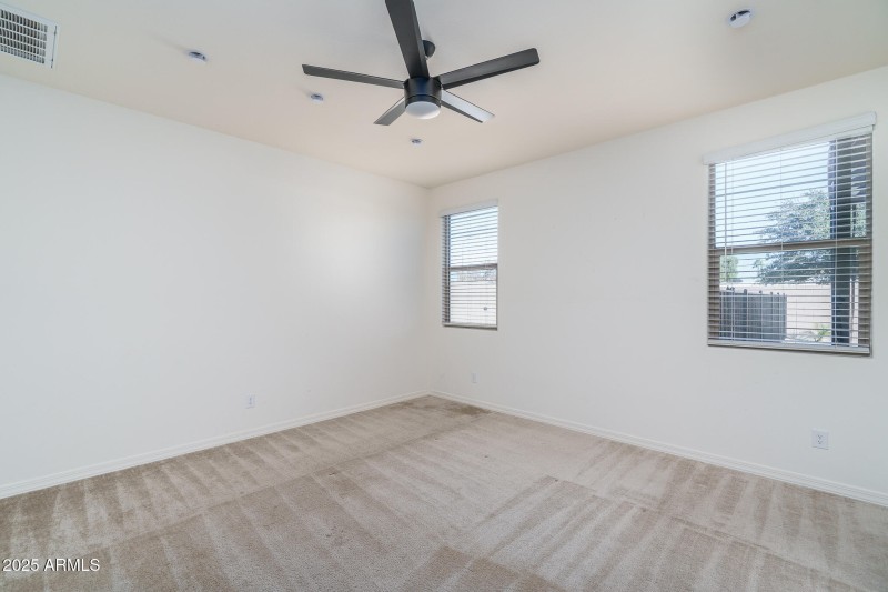 10) PRIMARY BEDROOM