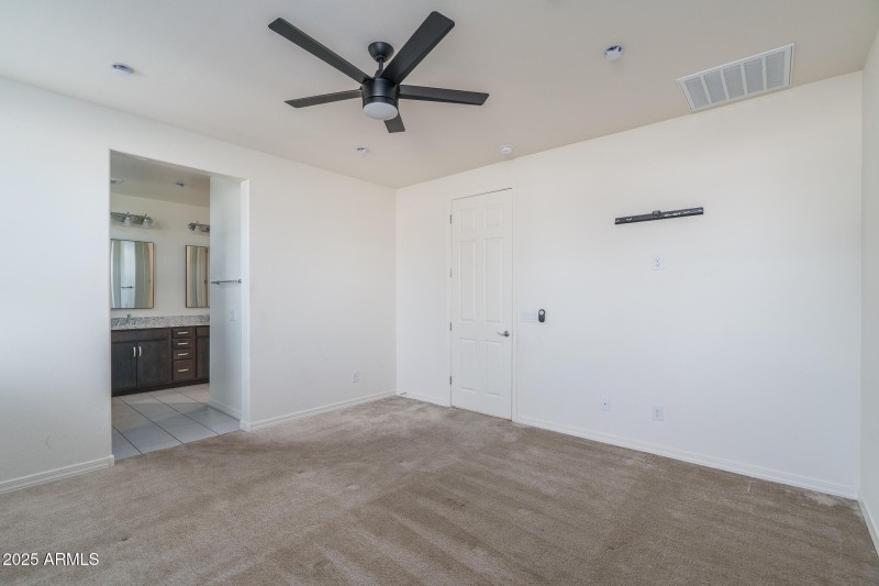 11) PRIMARY BEDROOM