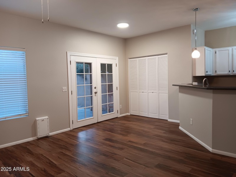 Double doors to covered patio and garage