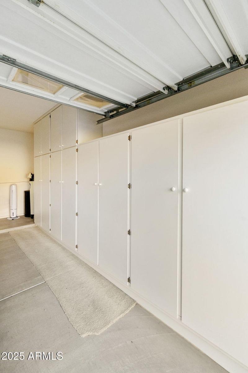 Garage with built-in cabinets