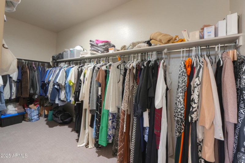 Huge walk-in closet in primary