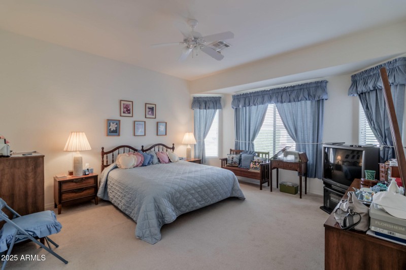 master bedroom with large windows