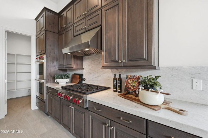 Dark Cabinetry W Neutral Backsplash