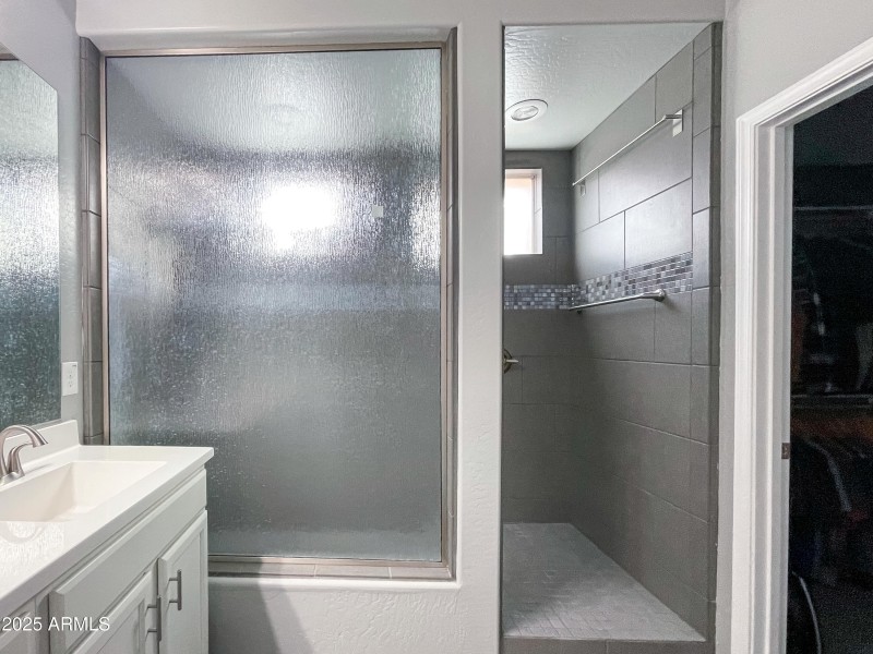 Walk In Shower and Double Sinks