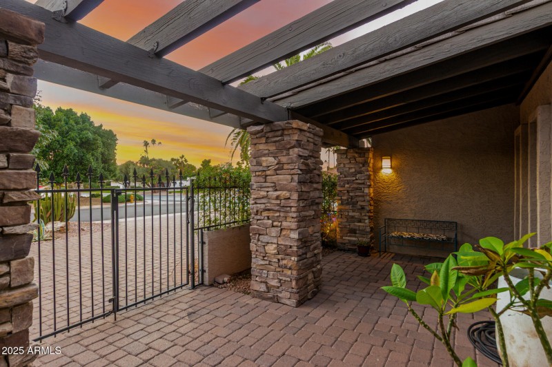 Courtyard nicely paved w/seating area.