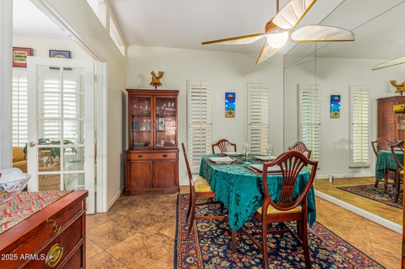 Formal dining room with french doors.
